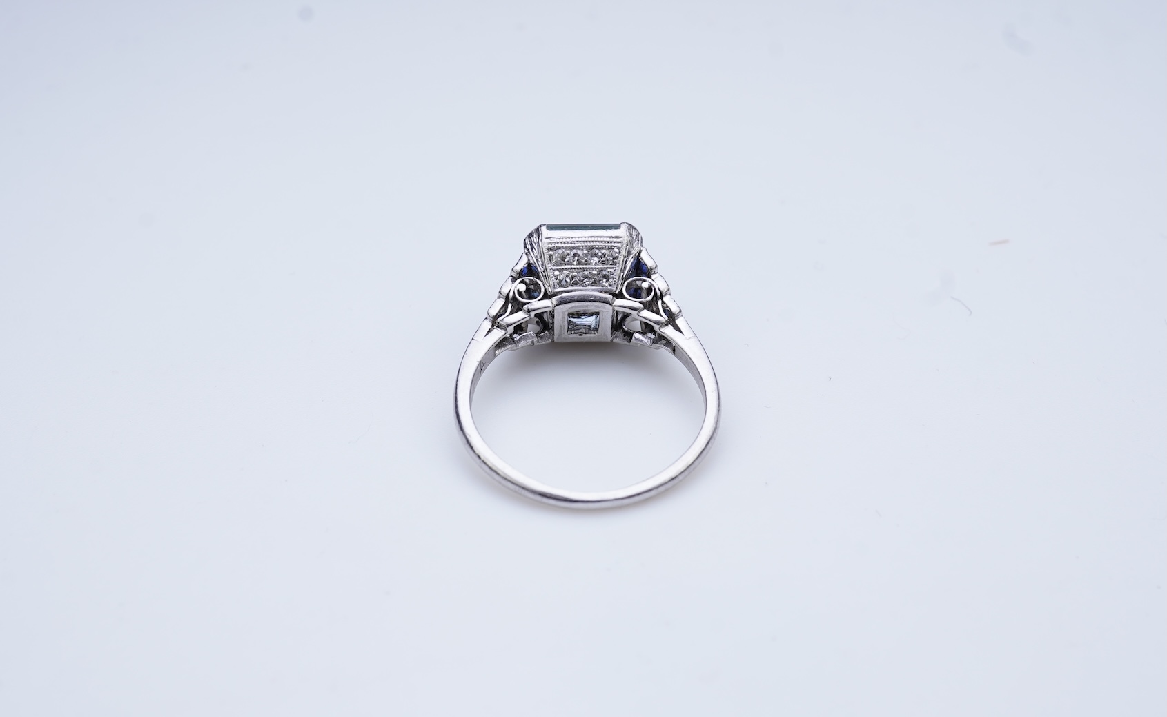 An aquamarine, sapphire and diamond ring